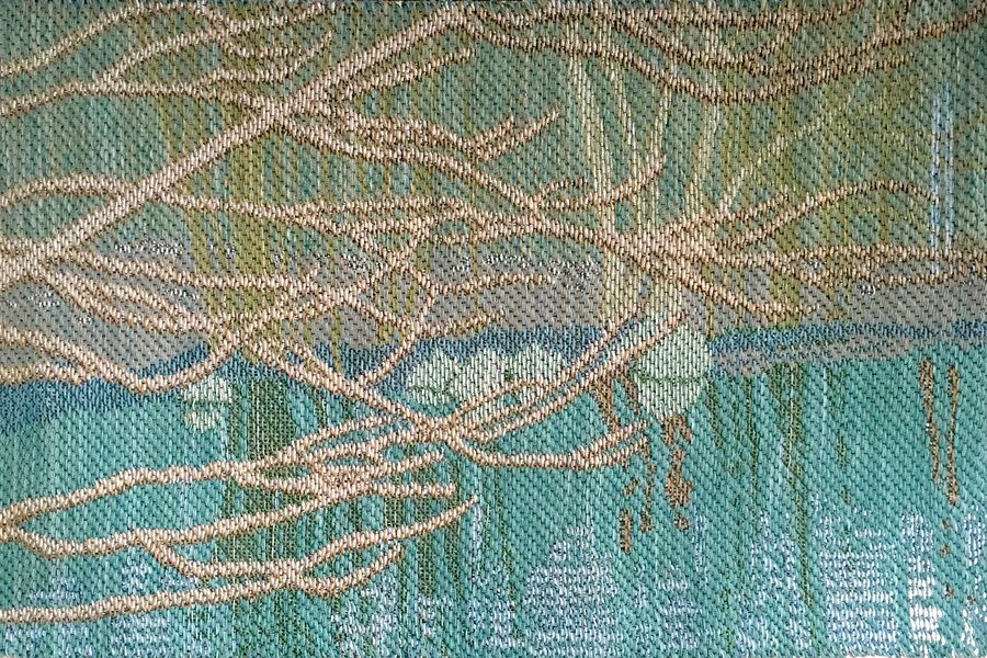 Crippled symmetry  147 x 220 cm Digital jacquard weaving, braided synthetic fibres, reflective yarn